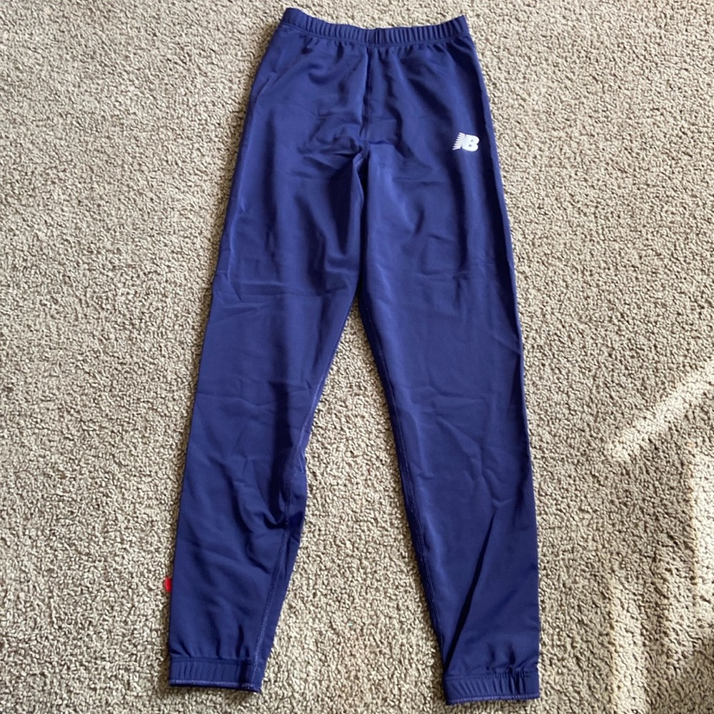 Blue NB running tights. Size small.